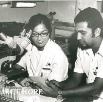 Linda Nims, Medical Technologist, with counterpart in laboratory